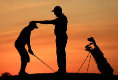 stock-photo-10431310-golf-instructor-with-student-on-the-driving-range